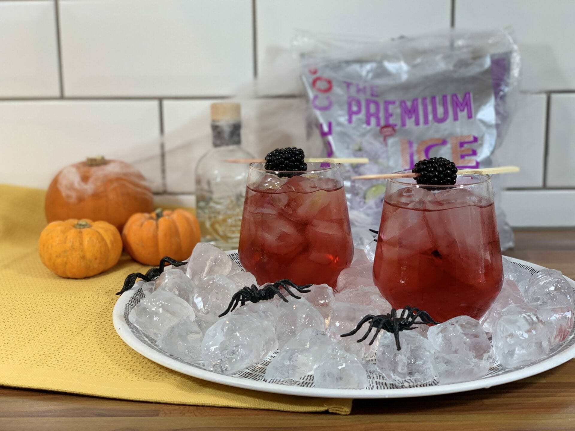 black widow cocktails in front of Premium Ice bag