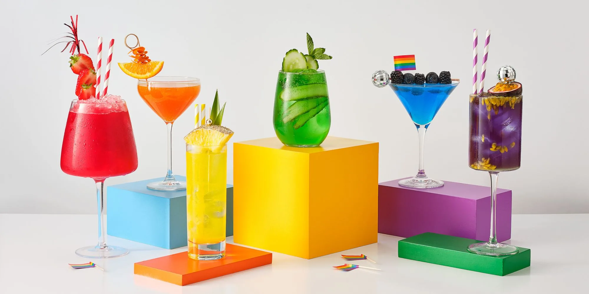 multicoloured pride cocktails in the colours of the pride flag