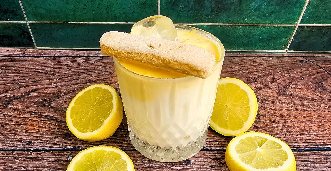 limoncello tiramisu cocktail with lady finger garnish