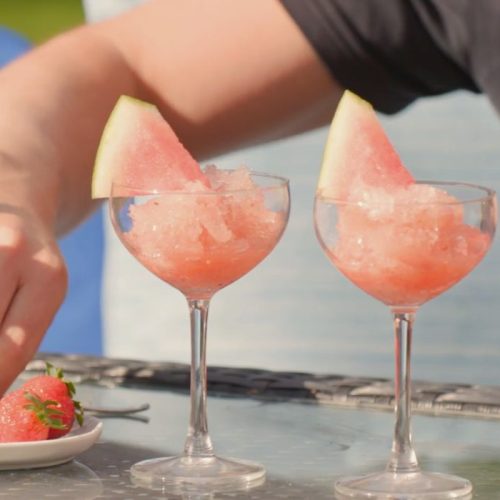 Watermelon Froze Sangria in coupe glasses in the sun