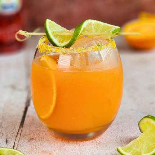 aperol margarita cocktail garnished with fresh citrus fruit